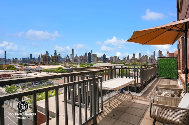 balcony featuring a view of city