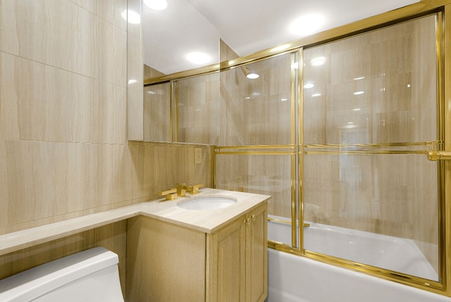 7020 108th St Unit 7E/F, New York City, NY 11375 - full bath with toilet, shower / bath combination with glass door, vanity, and tile walls