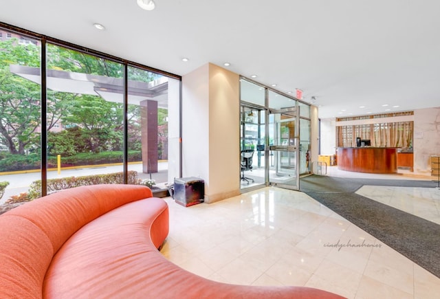 7020 108th St Unit 7E/F, New York City, NY 11375 - community lobby featuring a wall of windows and recessed lighting