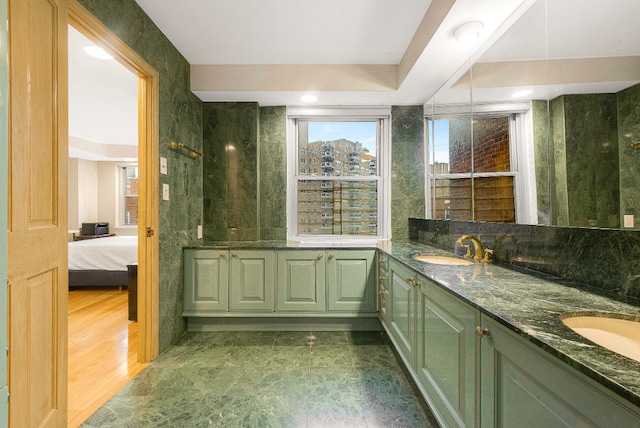 bathroom featuring vanity and hardwood / wood-style floors