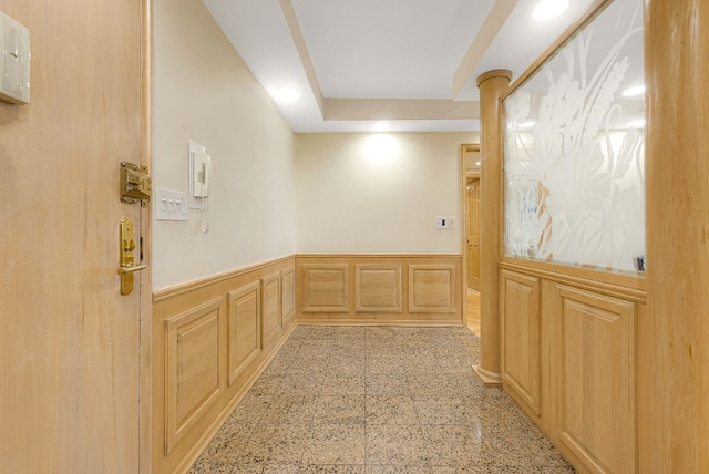 7020 108th St Unit 7E/F, New York City, NY 11375 - hallway with granite tiled floors, a wainscoted wall, a decorative wall, and recessed lighting