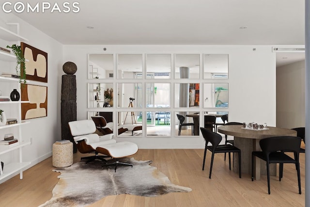 dining area featuring light wood-type flooring