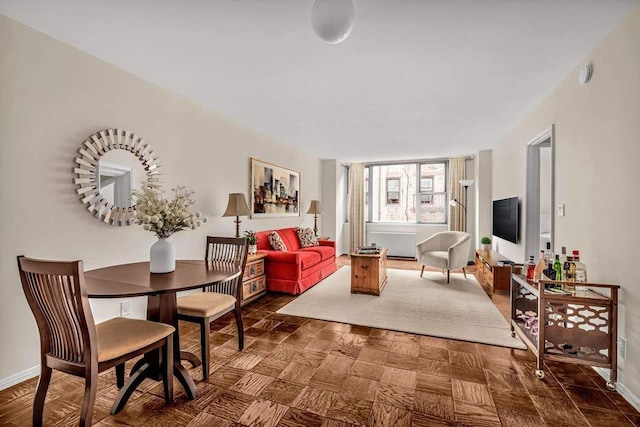 living area with baseboards