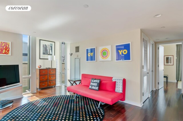 living room featuring dark hardwood / wood-style floors