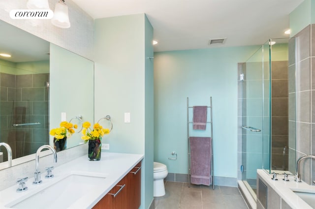 full bathroom featuring independent shower and bath, vanity, tile patterned flooring, and toilet