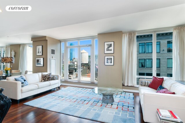 living room featuring dark hardwood / wood-style flooring