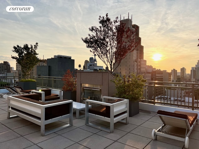 view of patio terrace at dusk