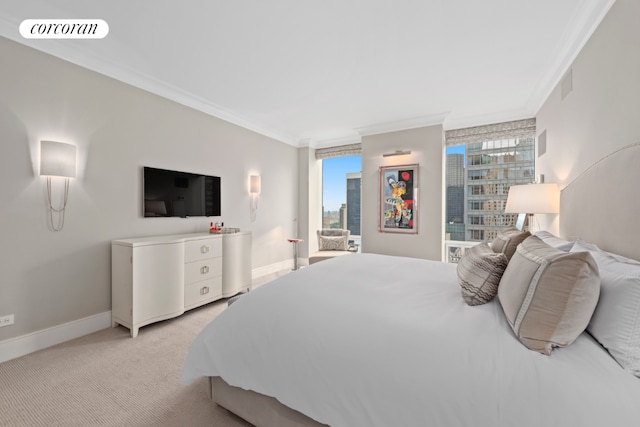 carpeted bedroom with crown molding