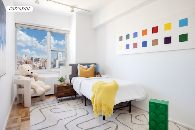 bedroom with parquet flooring