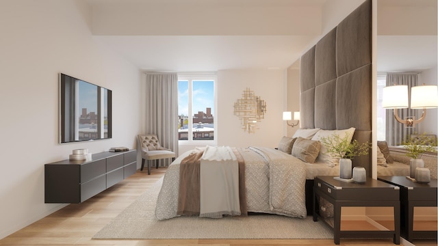 bedroom featuring light wood-style flooring
