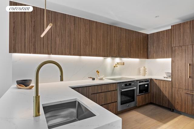 kitchen featuring modern cabinets and oven
