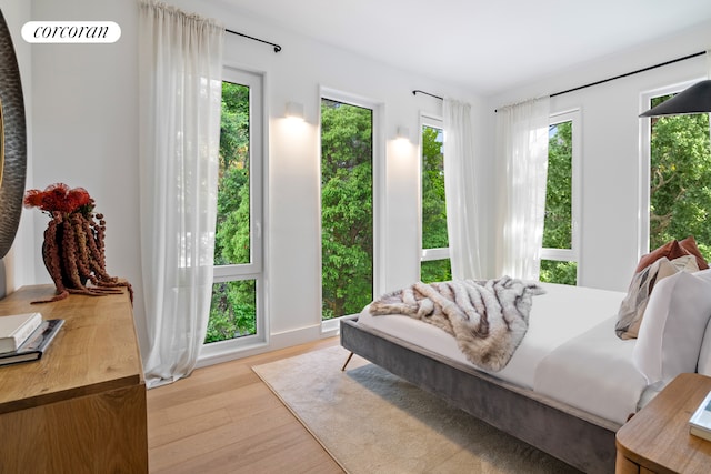 bedroom featuring wood finished floors