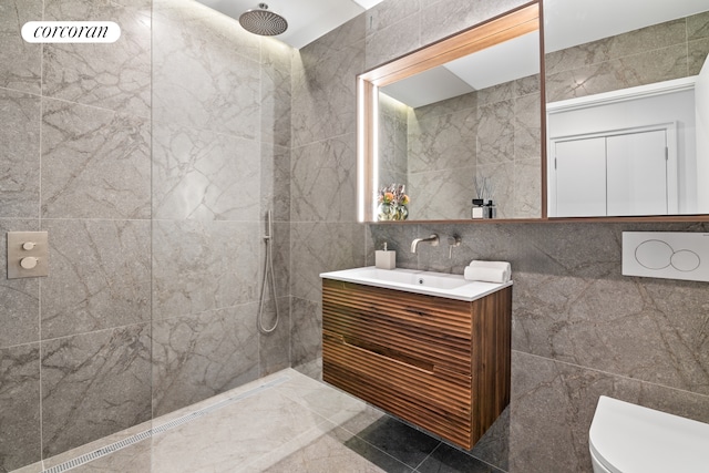 bathroom featuring walk in shower, tile walls, toilet, and vanity