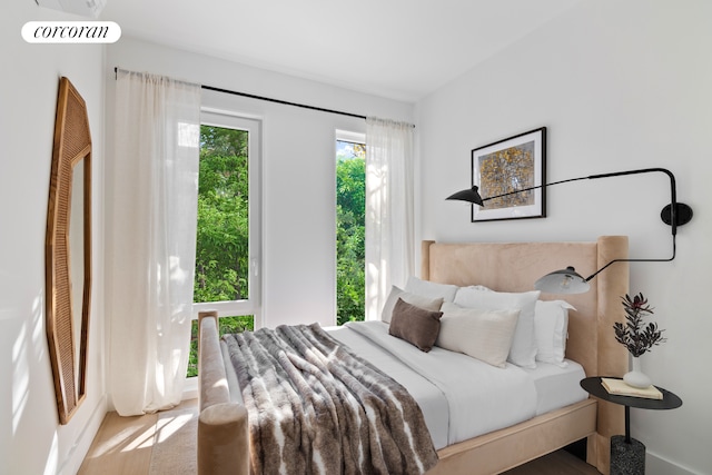 bedroom with wood finished floors
