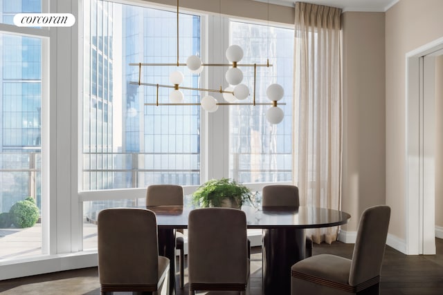 35 Hudson Yards Unit 7302, New York City, NY 10001 - dining room featuring a chandelier, plenty of natural light, and baseboards