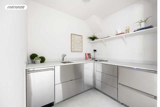 kitchen with sink and stainless steel dishwasher