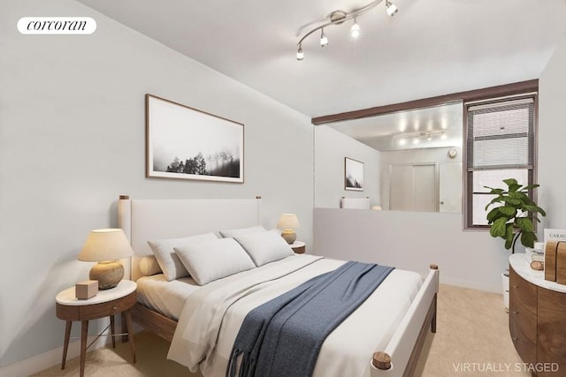 bedroom featuring light colored carpet