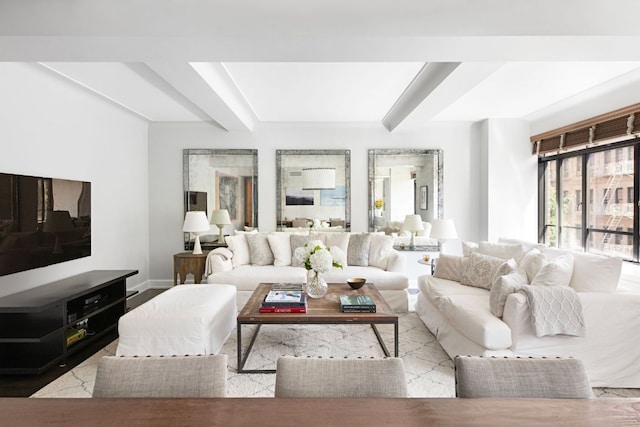 living room with beamed ceiling