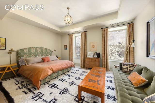 bedroom featuring a tray ceiling