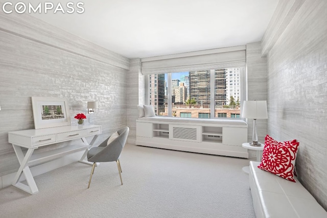 sitting room with carpet flooring