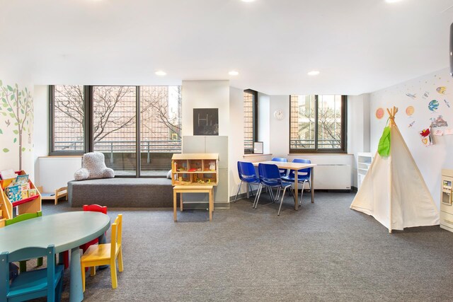 playroom featuring recessed lighting and carpet flooring