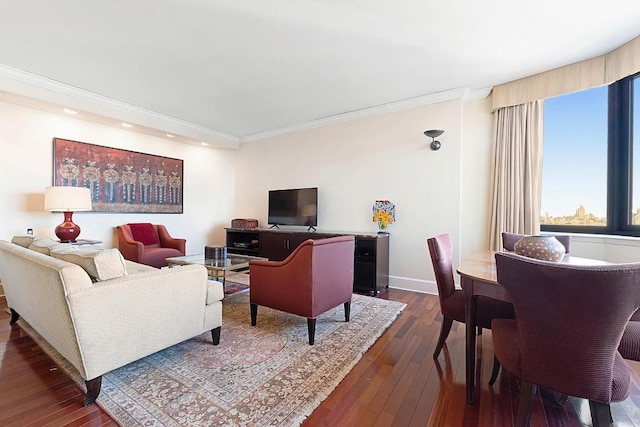 living room featuring dark hardwood / wood-style flooring and ornamental molding