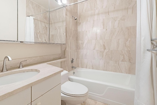 full bathroom featuring vanity, shower / bathtub combination with curtain, and toilet