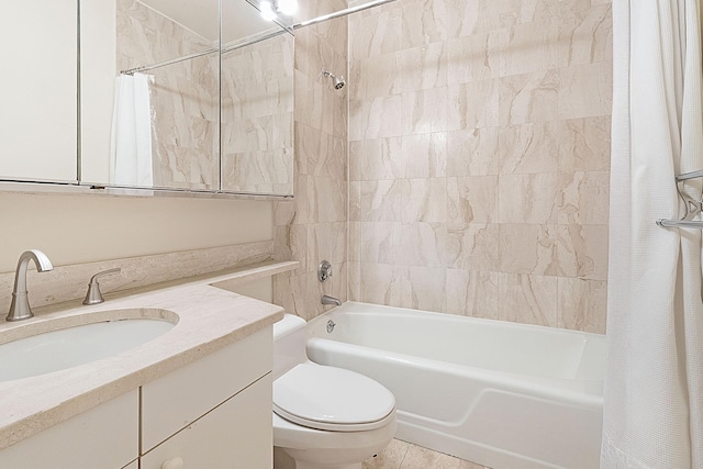 full bathroom with vanity, toilet, and shower / bath combo with shower curtain