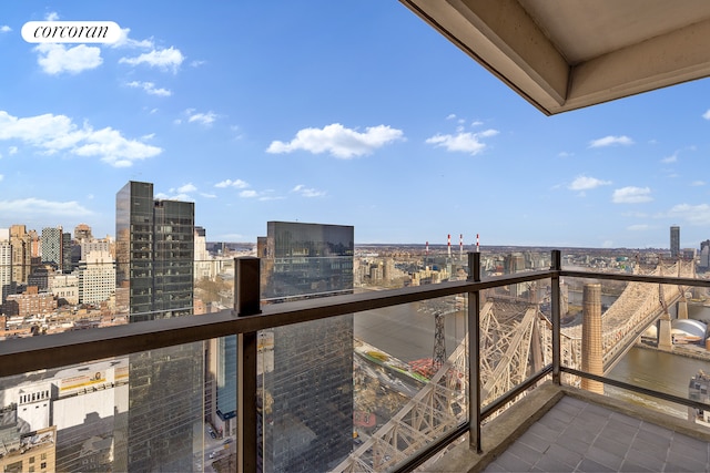 balcony featuring a city view