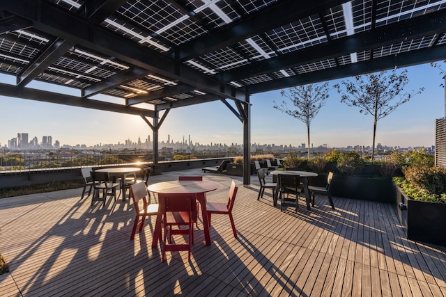 wooden terrace with a pergola