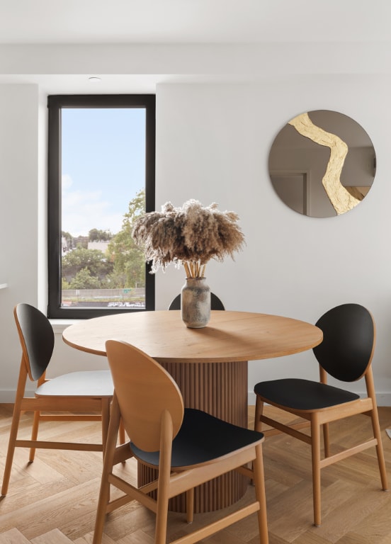 dining area featuring light parquet flooring