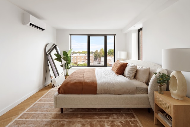 bedroom with a wall unit AC