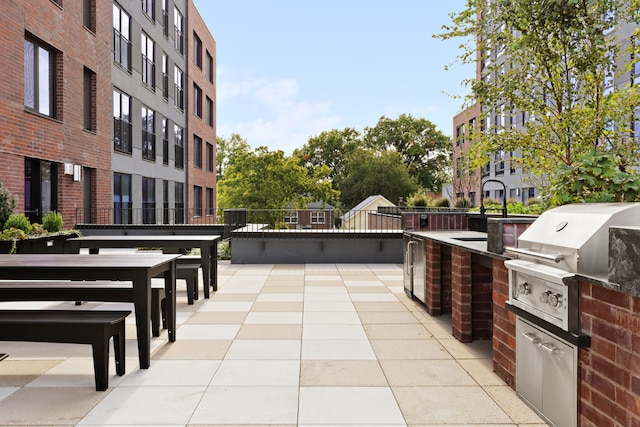 view of patio / terrace featuring grilling area and exterior kitchen