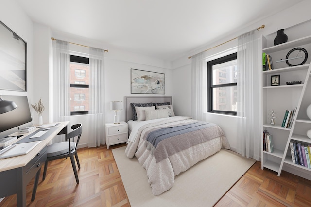 bedroom with multiple windows