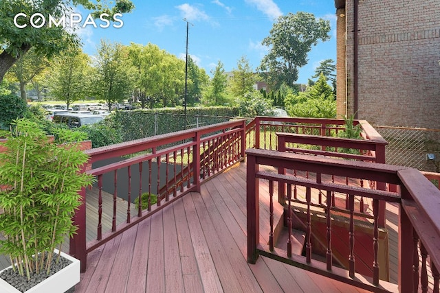 wooden terrace with fence