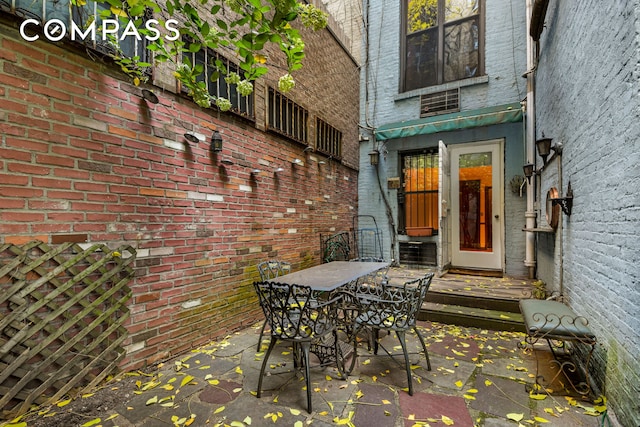 view of patio featuring outdoor dining space