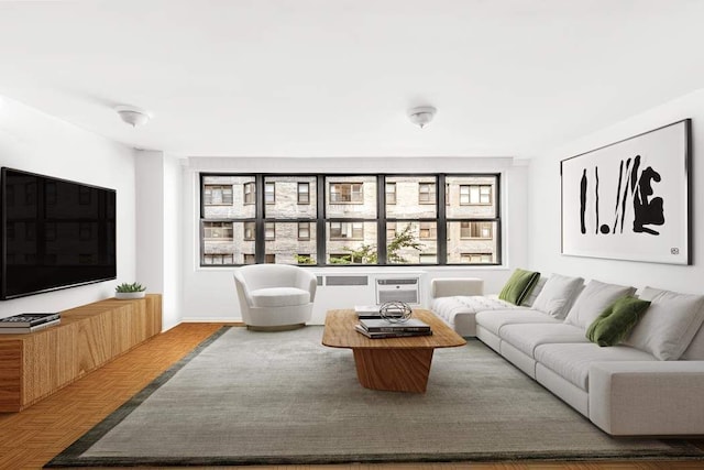 living room featuring hardwood / wood-style floors and radiator heating unit