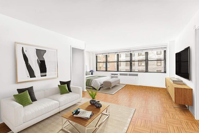 living room featuring light parquet floors