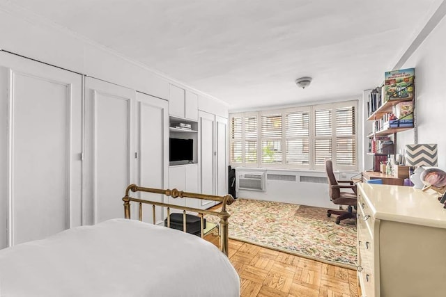 209 E 56th St Unit 5Abc, New York City, NY 10022 - bedroom with crown molding and a wall unit AC