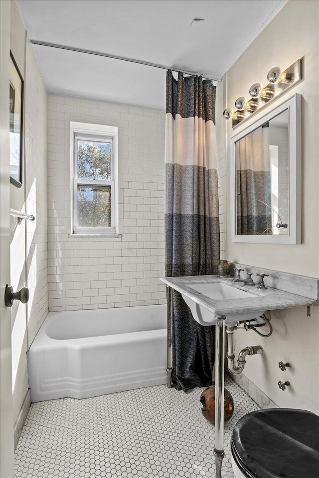 full bath featuring shower / bath combo