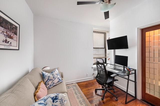 office space featuring ceiling fan and hardwood / wood-style flooring