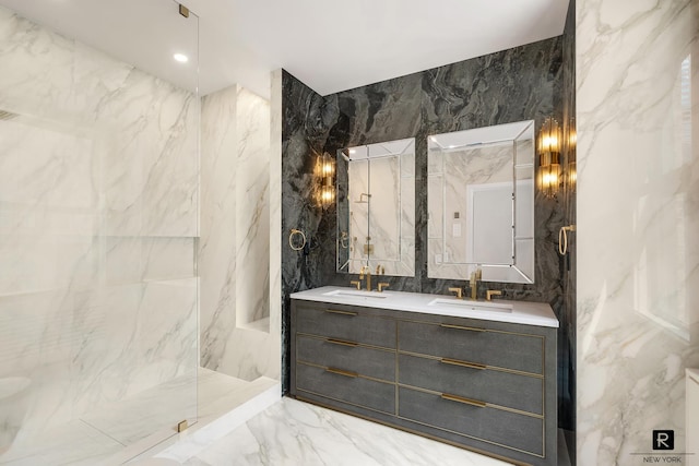 171 W 57th St Unit 6-B, New York City, NY 10019 - bathroom with tile walls, marble tiled floors, double vanity, and a marble finish shower