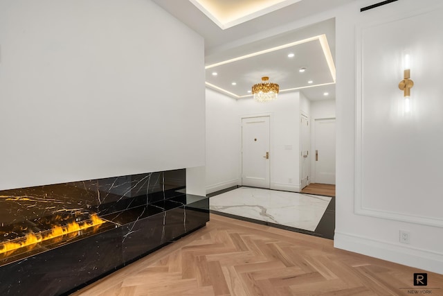 171 W 57th St Unit 6-B, New York City, NY 10019 - foyer featuring recessed lighting and a chandelier