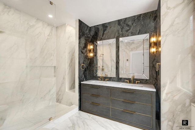 bathroom with tile walls, vanity, and a shower