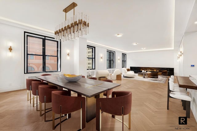 dining space featuring baseboards