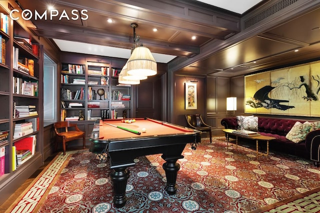 playroom with billiards, built in features, a decorative wall, and beam ceiling