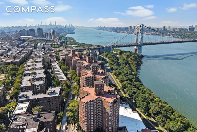 aerial view featuring a water view and a city view