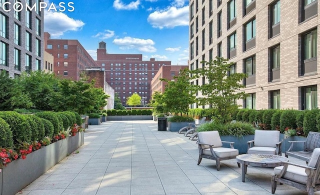 view of home's community featuring a patio