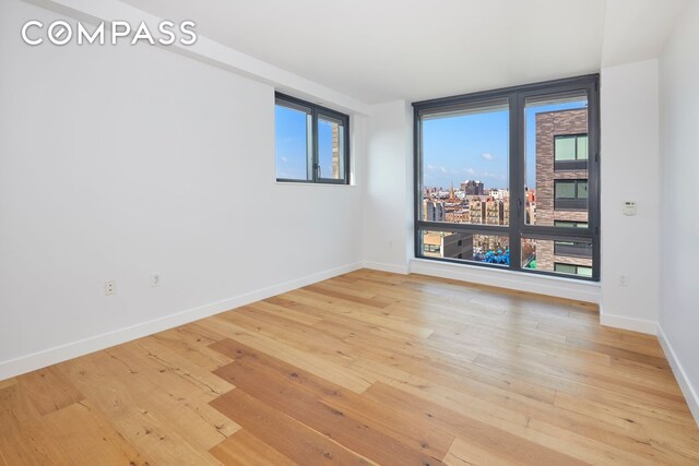 office with hardwood / wood-style flooring