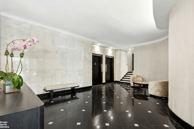 215 E 79th St Unit 6F, New York City, NY 10075 - building lobby with stairway and crown molding